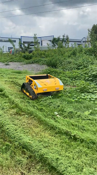 HS224 lawn mowing operation