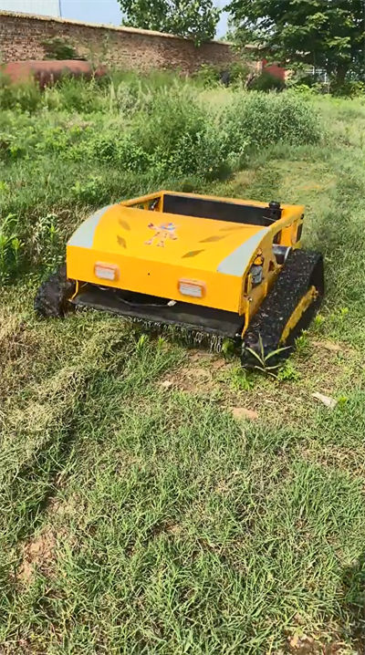 HS224 lawn mowing operation