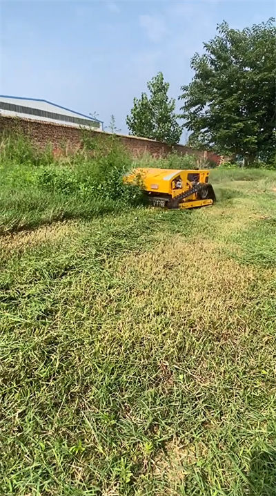 HS224 lawn mowing operation