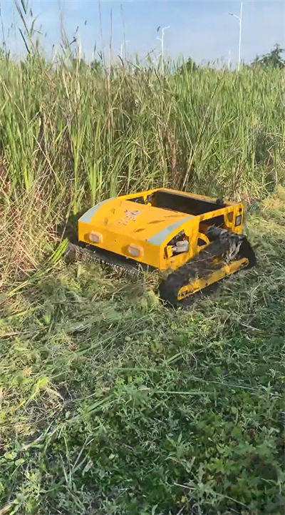 HS224 lawn mowing operation